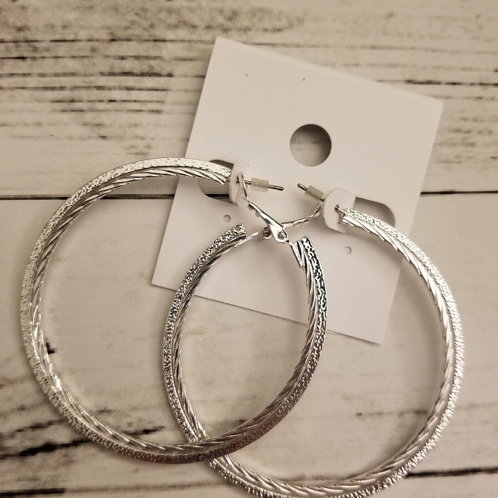 Silver textured large hoop earrings. Nwt